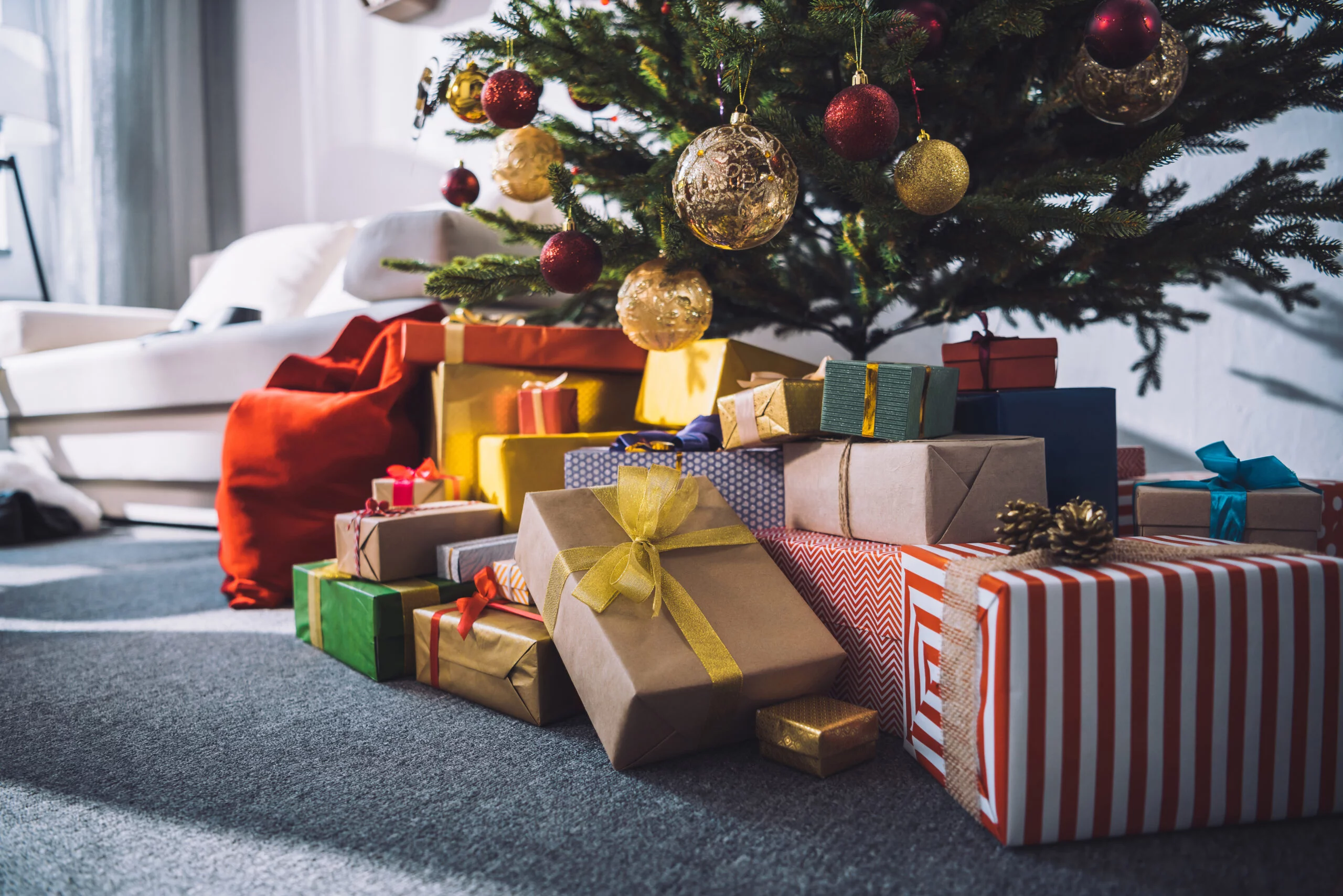 Christmas Trees with several presents under tree