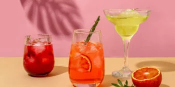 Popular summer ice alcoholic cocktails served under the summer sun light