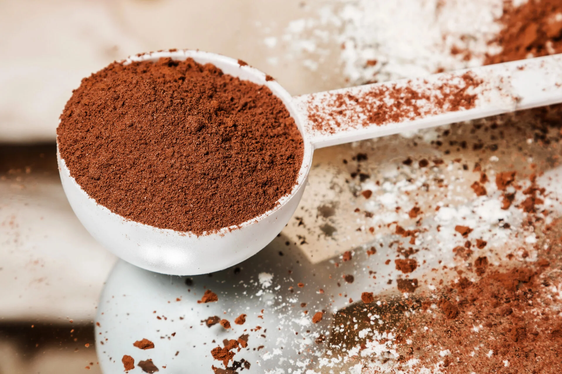 Chocolate protein powder on top of a mirror