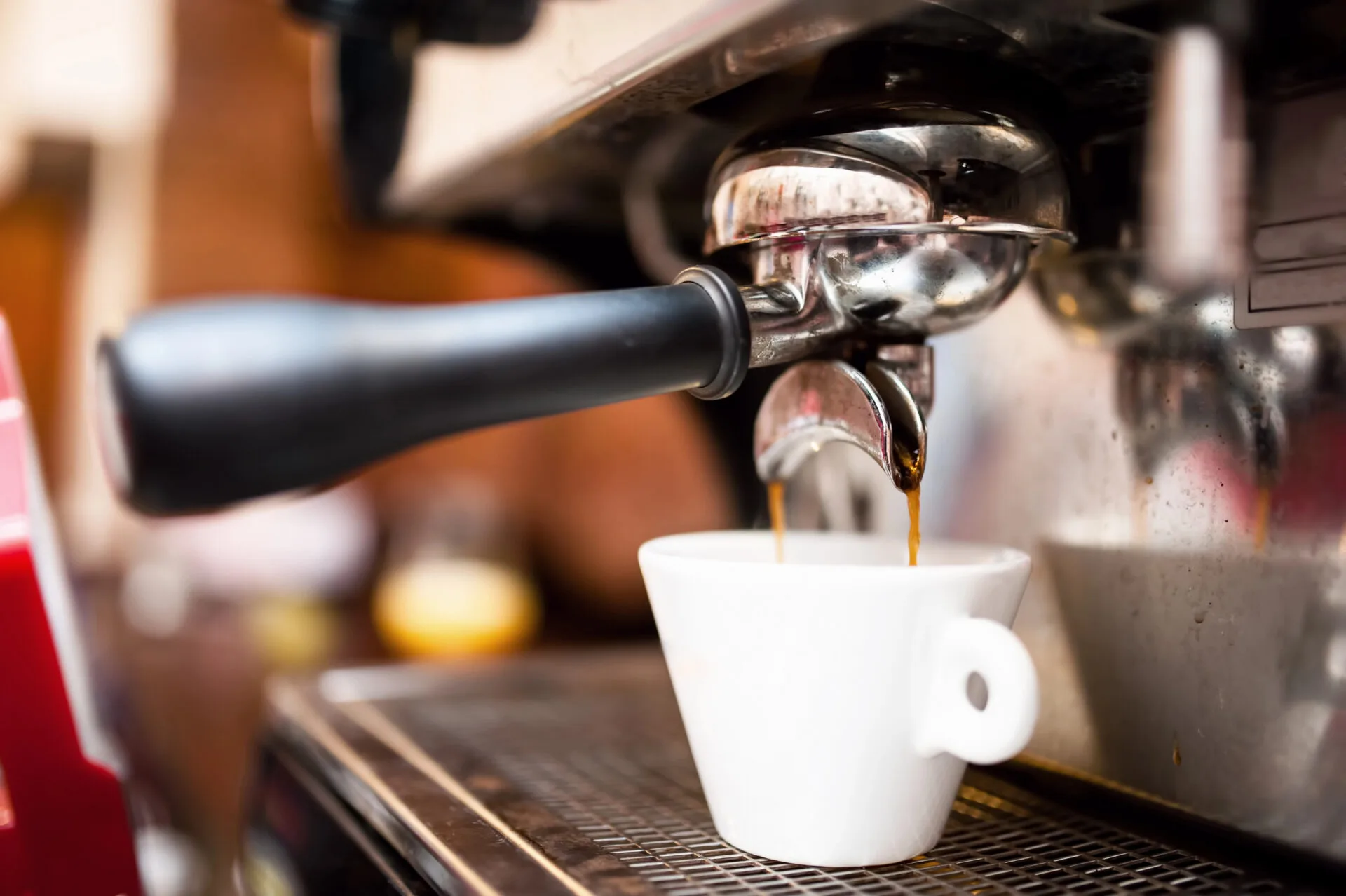 Espresso machine at a cafe with an espresso being made