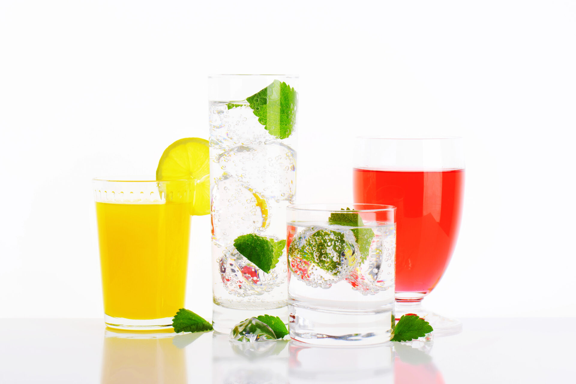 Sparkling water and probiotic soda tested for PFAS "forever chemicals" on the table with some lime