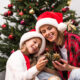 Mother and daughter in front of the Christmas tree
