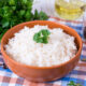Basmati Rice sitting on the table in a orange ceramic bowl