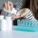 Woman pours out multivitamins into her hand
