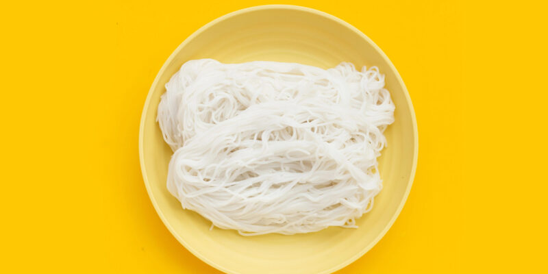 Noodles in a yellow bowl