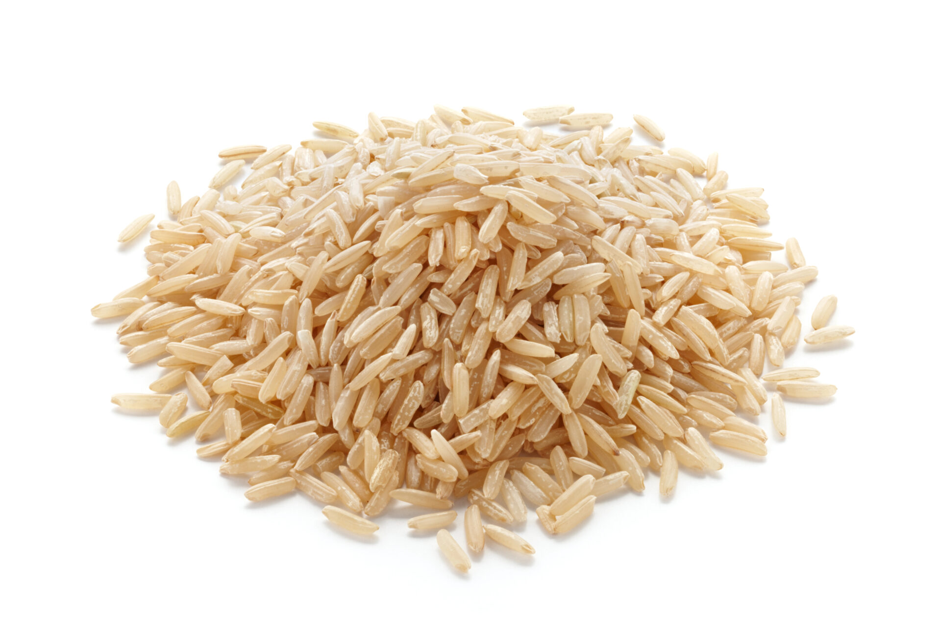 pile of brown rice isolated on white