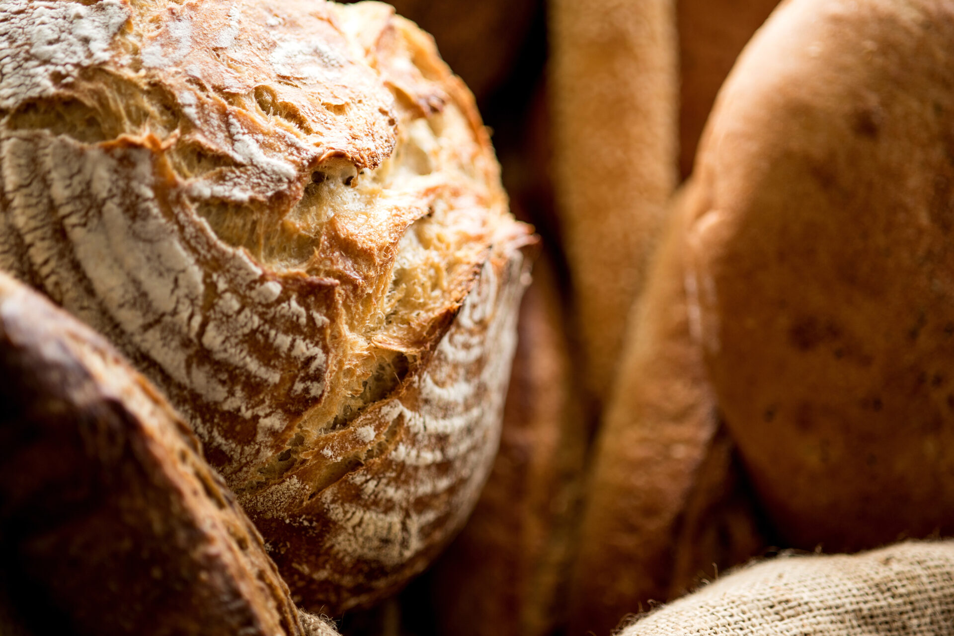 Sourdough bread being baked and sold