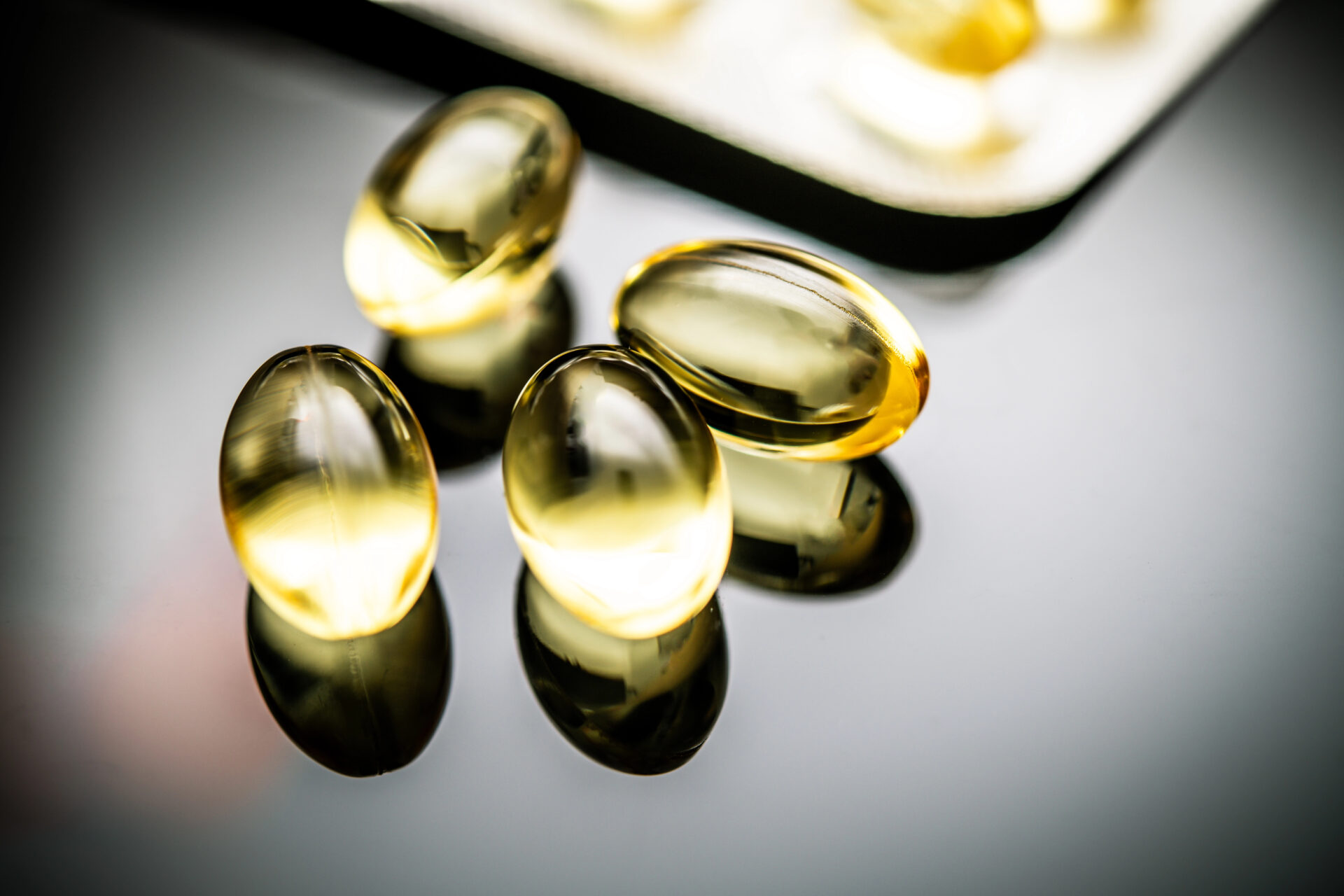 Vitamin D Supplements on a black table
