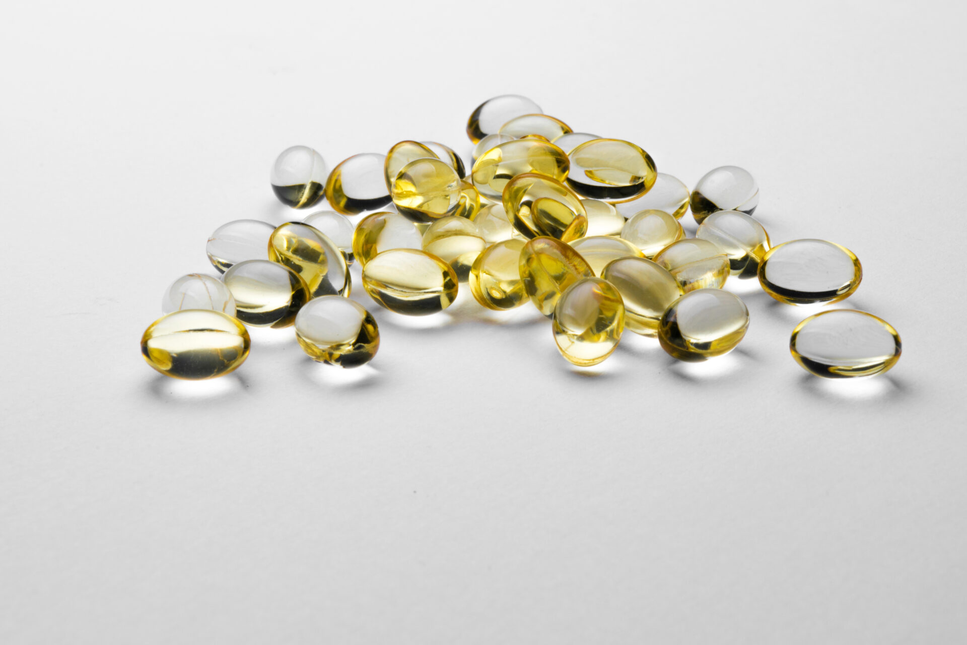 Vitamin D Supplements on a grey background table