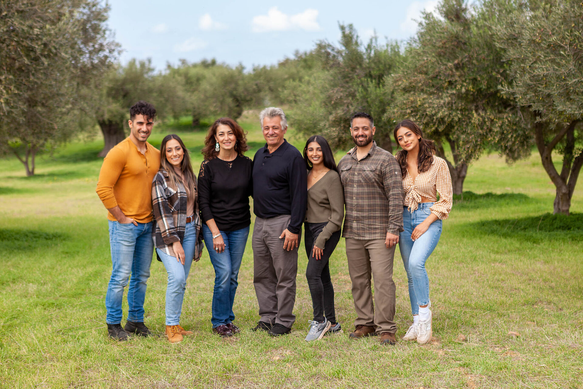 Kasandrinos Family in front of USDA organic olive oil groves