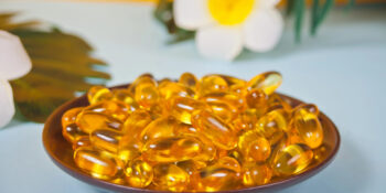 Omega-3s & DHA capsules on a table