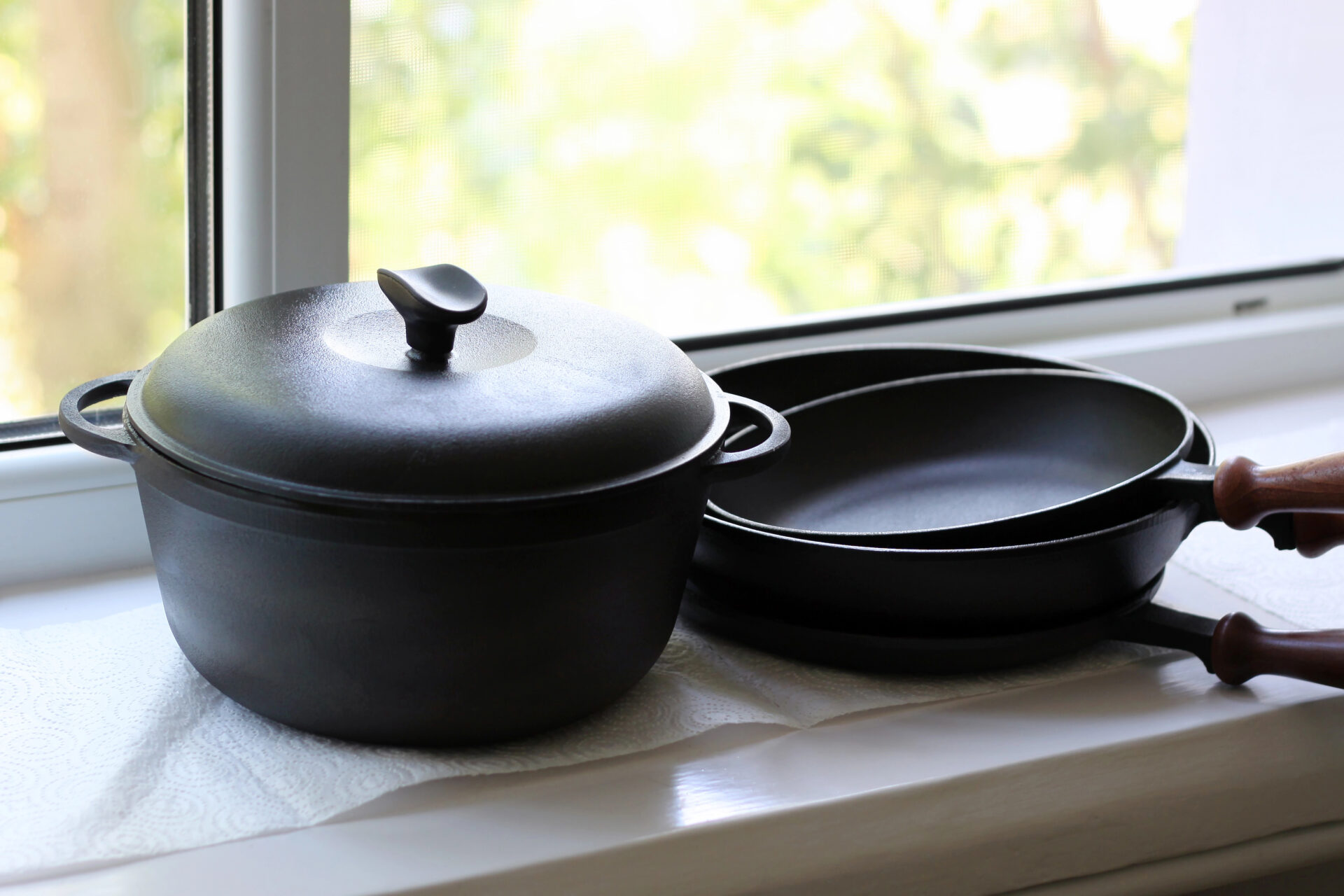 Cast iron cookware in the window sill